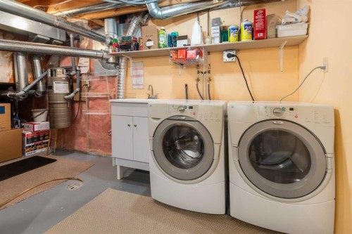 232 Millbank Drive Sw, Calgary, AB - Indoor Photo Showing Laundry Room