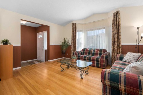 232 Millbank Drive Sw, Calgary, AB - Indoor Photo Showing Living Room