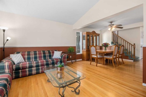 232 Millbank Drive Sw, Calgary, AB - Indoor Photo Showing Living Room