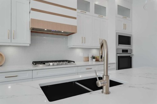 3536 43 Street Sw, Calgary, AB - Indoor Photo Showing Kitchen With Double Sink