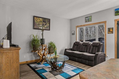 4-36 Windridge Road, Exshaw, AB - Indoor Photo Showing Living Room