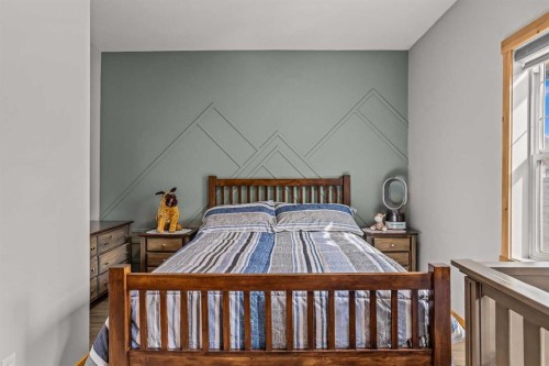 4-36 Windridge Road, Exshaw, AB - Indoor Photo Showing Bedroom