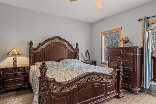 4-36 Windridge Road, Exshaw, AB - Indoor Photo Showing Bedroom