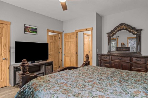 4-36 Windridge Road, Exshaw, AB - Indoor Photo Showing Bedroom