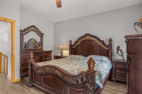 4-36 Windridge Road, Exshaw, AB - Indoor Photo Showing Bedroom