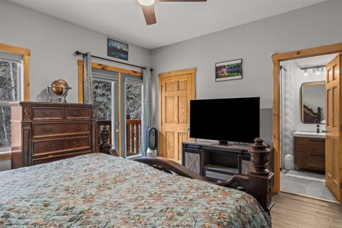 4-36 Windridge Road, Exshaw, AB - Indoor Photo Showing Bedroom