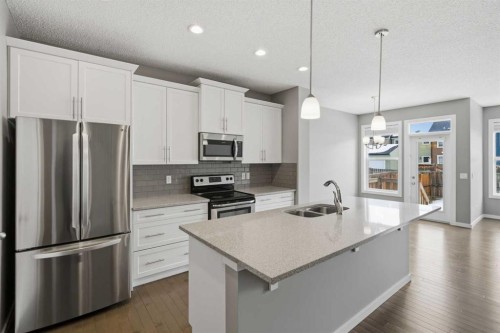 54 Legacy Close Se, Calgary, AB - Indoor Photo Showing Kitchen With Stainless Steel Kitchen With Double Sink With Upgraded Kitchen