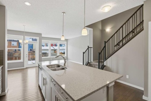 54 Legacy Close Se, Calgary, AB - Indoor Photo Showing Kitchen With Double Sink