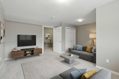 54 Legacy Close Se, Calgary, AB - Indoor Photo Showing Living Room