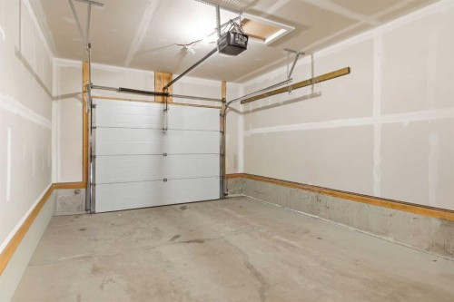 54 Legacy Close Se, Calgary, AB - Indoor Photo Showing Garage