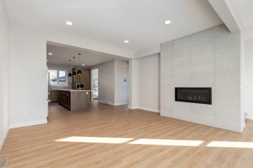 2516 21 Avenue Sw, Calgary, AB - Indoor Photo Showing Living Room With Fireplace
