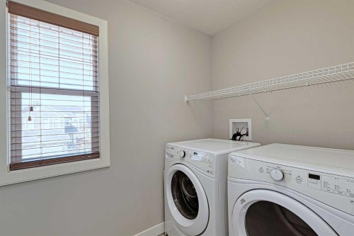 107 Nolancrest Rise Nw, Calgary, AB - Indoor Photo Showing Laundry Room