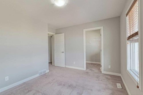 107 Nolancrest Rise Nw, Calgary, AB - Indoor Photo Showing Other Room