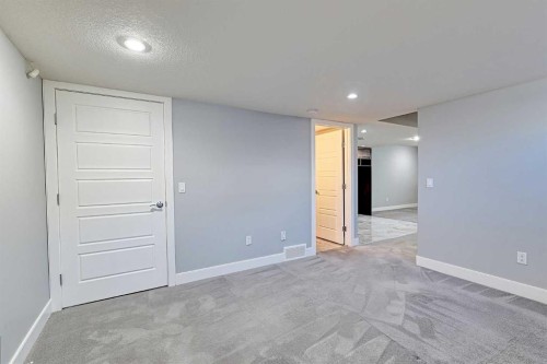 107 Nolancrest Rise Nw, Calgary, AB - Indoor Photo Showing Other Room