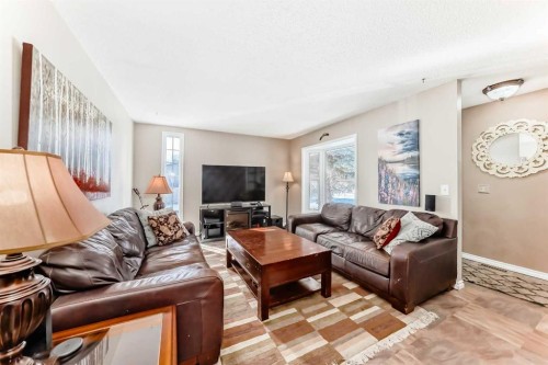 48 Midglen Way Se, Calgary, AB - Indoor Photo Showing Living Room