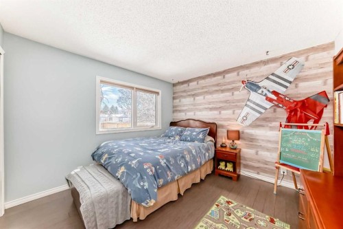 48 Midglen Way Se, Calgary, AB - Indoor Photo Showing Bedroom