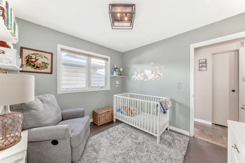 48 Midglen Way Se, Calgary, AB - Indoor Photo Showing Bedroom
