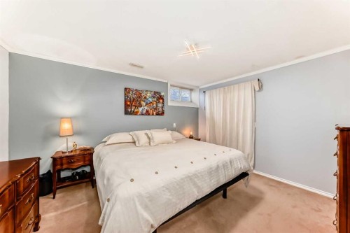48 Midglen Way Se, Calgary, AB - Indoor Photo Showing Bedroom