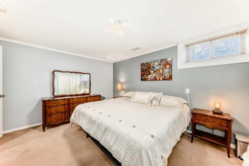 48 Midglen Way Se, Calgary, AB - Indoor Photo Showing Bedroom