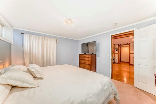 48 Midglen Way Se, Calgary, AB - Indoor Photo Showing Bedroom