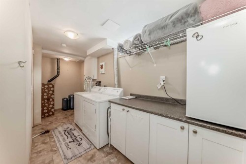48 Midglen Way Se, Calgary, AB - Indoor Photo Showing Laundry Room