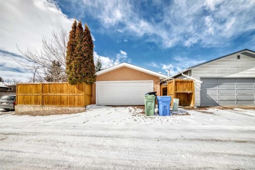 48 Midglen Way Se, Calgary, AB - Outdoor