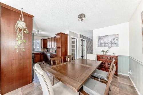 48 Midglen Way Se, Calgary, AB - Indoor Photo Showing Dining Room
