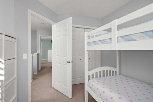 47 Eversyde Heath Sw, Calgary, AB - Indoor Photo Showing Bedroom