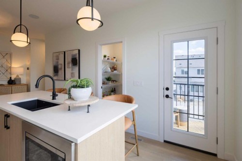 145 Wild Rose Way Se, Calgary, AB - Indoor Photo Showing Kitchen