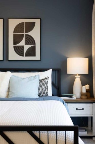 145 Wild Rose Way Se, Calgary, AB - Indoor Photo Showing Bedroom