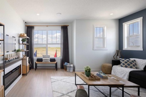 145 Wild Rose Way Se, Calgary, AB - Indoor Photo Showing Living Room