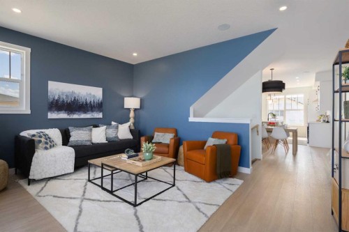 145 Wild Rose Way Se, Calgary, AB - Indoor Photo Showing Living Room