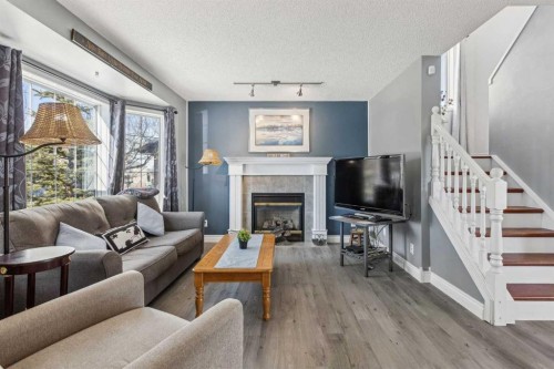 30 Martha'S Haven Manor Ne, Calgary, AB - Indoor Photo Showing Living Room With Fireplace