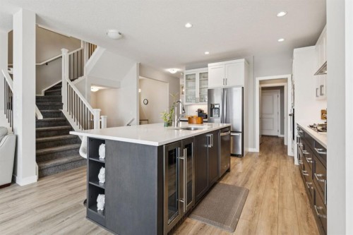 415 Rivercrest Boulevard, Cochrane, AB - Indoor Photo Showing Kitchen With Upgraded Kitchen