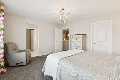 415 Rivercrest Boulevard, Cochrane, AB - Indoor Photo Showing Bedroom