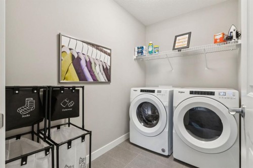415 Rivercrest Boulevard, Cochrane, AB - Indoor Photo Showing Laundry Room