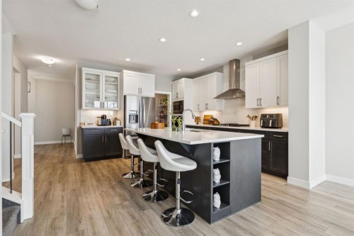 415 Rivercrest Boulevard, Cochrane, AB - Indoor Photo Showing Kitchen With Stainless Steel Kitchen With Upgraded Kitchen