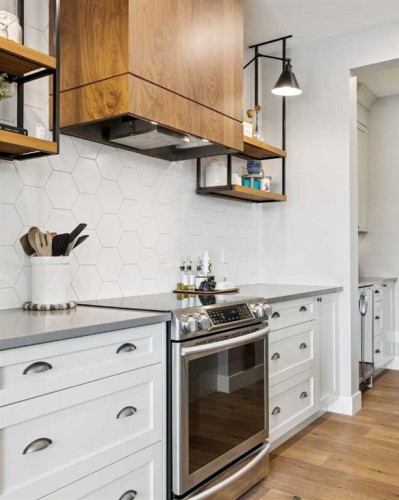 105 Masters Cape Se, Calgary, AB - Indoor Photo Showing Kitchen With Upgraded Kitchen