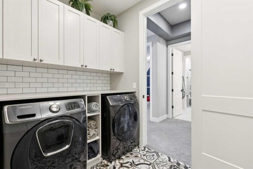 105 Masters Cape Se, Calgary, AB - Indoor Photo Showing Laundry Room