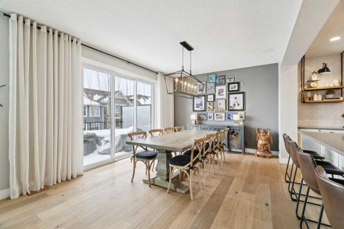 105 Masters Cape Se, Calgary, AB - Indoor Photo Showing Dining Room
