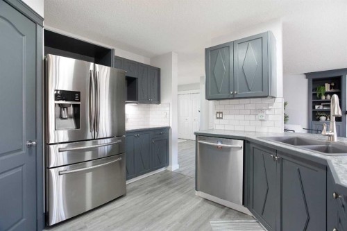 8 Thorndale Close Se, Airdrie, AB - Indoor Photo Showing Kitchen With Double Sink