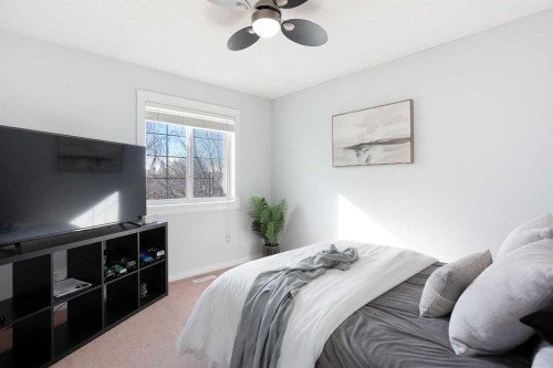 8 Thorndale Close Se, Airdrie, AB - Indoor Photo Showing Bedroom
