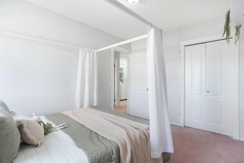 8 Thorndale Close Se, Airdrie, AB - Indoor Photo Showing Bedroom