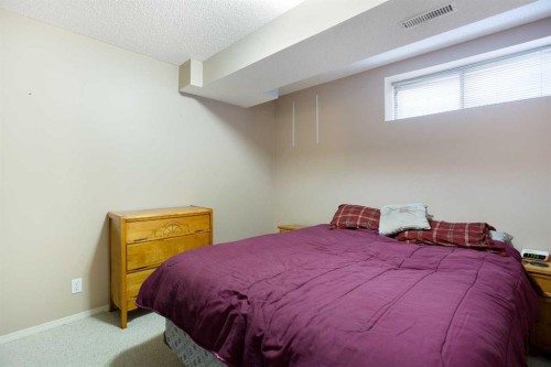 8 Thorndale Close Se, Airdrie, AB - Indoor Photo Showing Bedroom