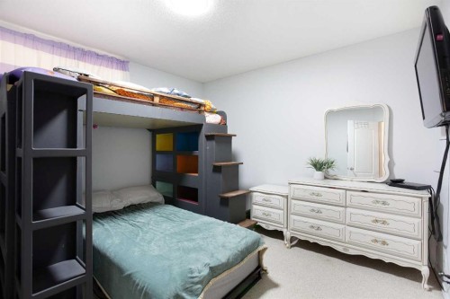 8 Thorndale Close Se, Airdrie, AB - Indoor Photo Showing Bedroom