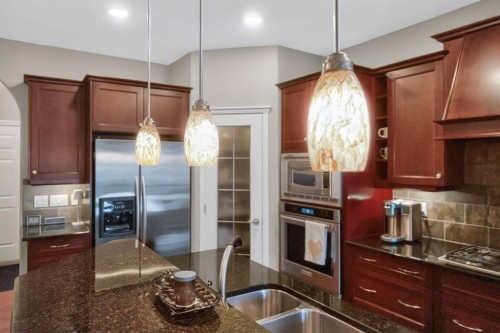 2735 Evercreek Bluffs Way Sw, Calgary, AB - Indoor Photo Showing Kitchen With Double Sink With Upgraded Kitchen