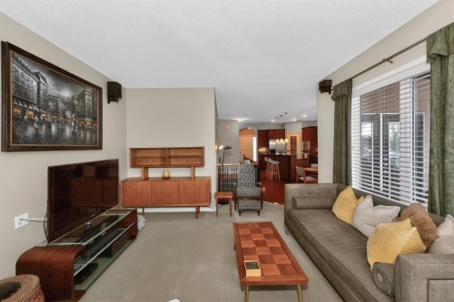 2735 Evercreek Bluffs Way Sw, Calgary, AB - Indoor Photo Showing Living Room