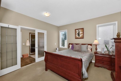 2735 Evercreek Bluffs Way Sw, Calgary, AB - Indoor Photo Showing Bedroom