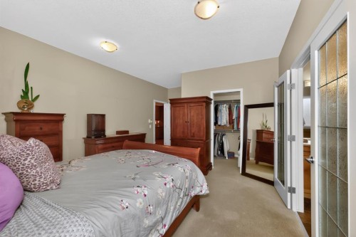 2735 Evercreek Bluffs Way Sw, Calgary, AB - Indoor Photo Showing Bedroom