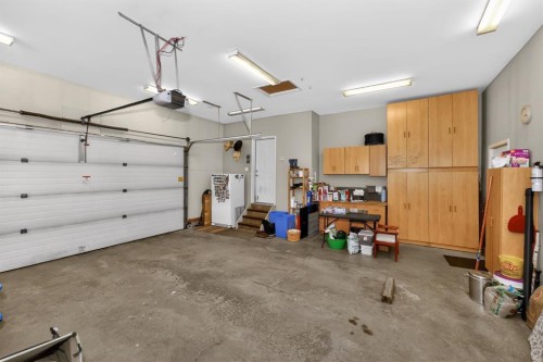 2735 Evercreek Bluffs Way Sw, Calgary, AB - Indoor Photo Showing Garage